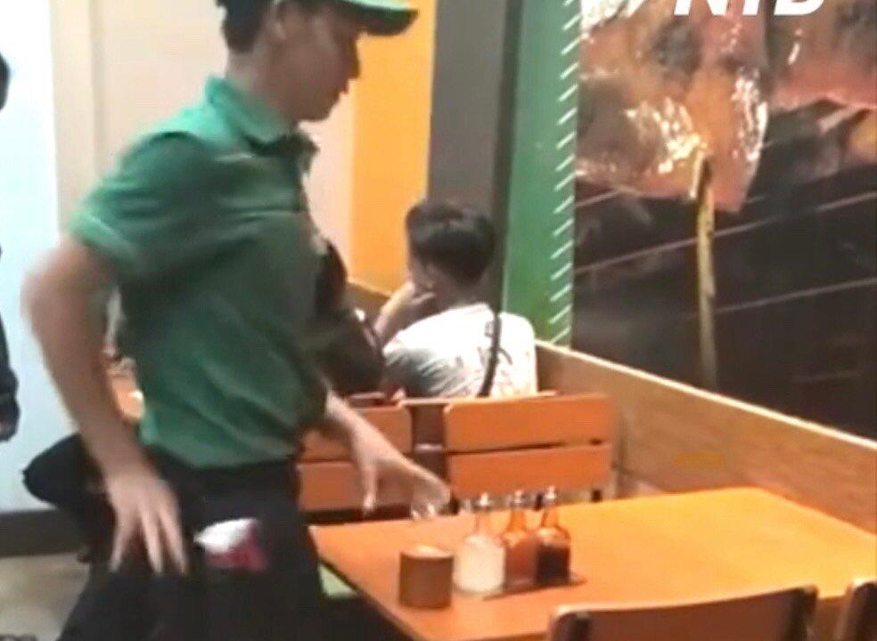Waiter Cleans and Sets Table With Flair