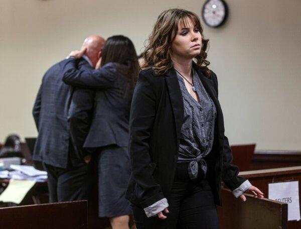 Hannah Gutierrez-Reed leaves the courtroom during a break in her trial on involuntary manslaughter and tampering with evidence charges in Santa Fe, N.M., on Feb. 29, 2024. (Gabriela Campos/Pool/Santa Fe New Mexican via AP)