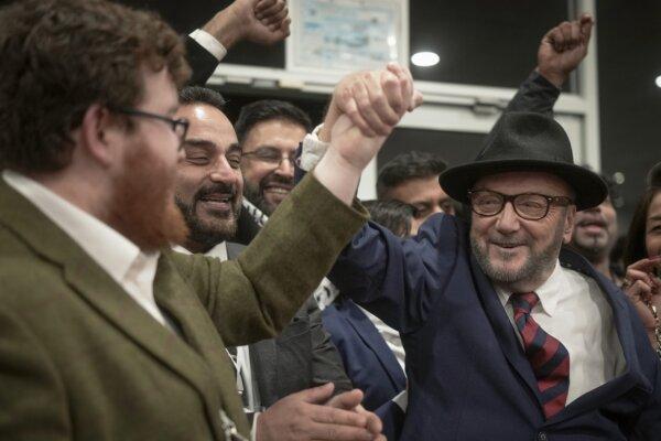Workers Party of Britain candidate George Galloway celebrates with supporters at his campaign headquarters after being declared the winner in the Rochdale by-election in Rochdale, England, on Feb. 29, 2024. (Christopher Furlong/Getty Images)