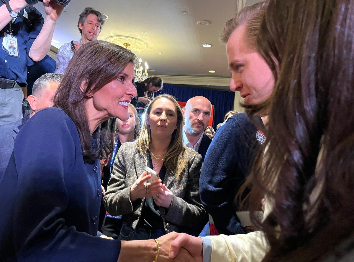Nikki Haley with supporters at the Madison Hotel, the only polling place for the District of Columbia Republican presidential primary, in Washington on March 1, 2024. (Terri Wu/The Epoch Times)