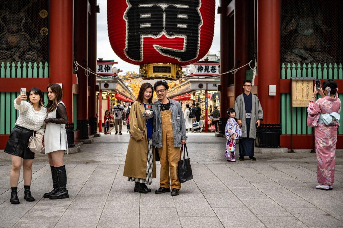 People visit Sensoji Temple, a popular tourist location, in Tokyo on Oct. 12, 2022. (Philip Fong/ AFP via Getty Images)