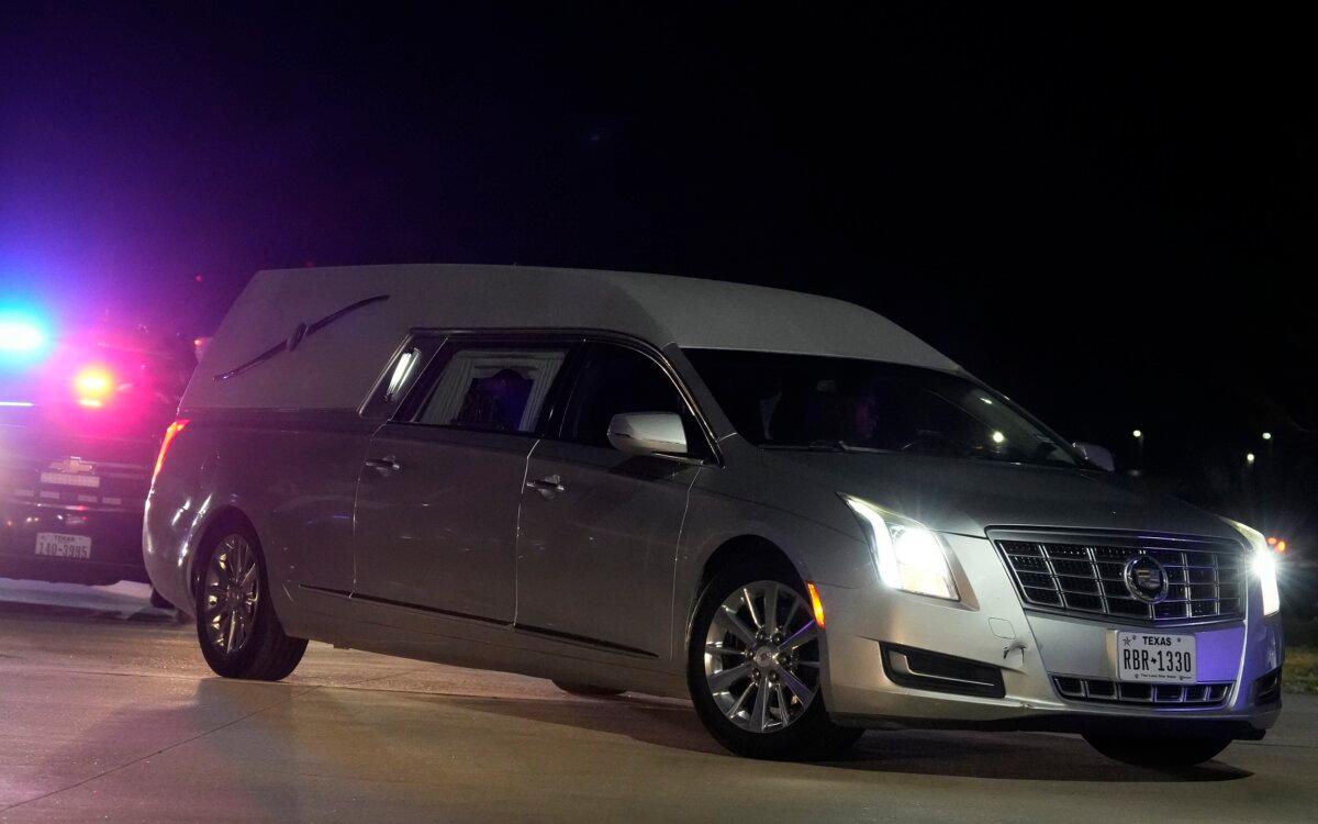 A hearse carrying Audrii Cunningham's casket drives away following a public visitation at First Baptist Church in Livingston, Texas, on March 1, 2024. (Yi-Chin Lee/Houston Chronicle via AP)