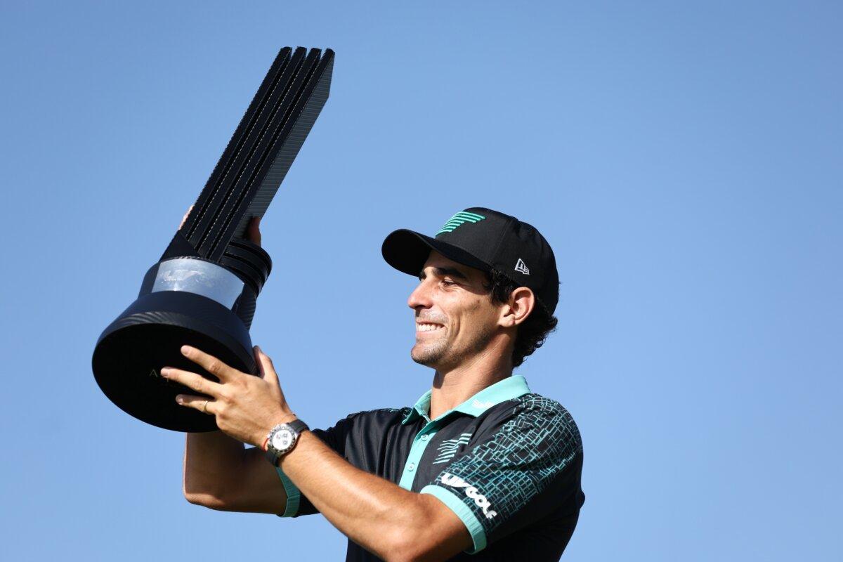 Joaquin Niemann of Torque GC poses for a photo with his trophy after winning the LIV Golf Invitational—Jeddah in King Abdullah Economic City, Saudi Arabia, on March 3, 2024. (Francois Nel/Getty Images)