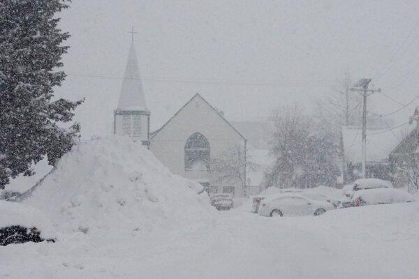 Snow piles up in front of a church during a storm, in Truckee, Calif., on March 3, 2024. (Brooke Hess-Homeier/AP Photo)
