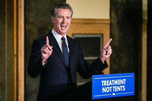 California Gov. Gavin Newsom speaks about mental health crisis before signing off on two major pieces of legislation to transform the state's mental health system and to address the state's worsening homelessness crisis in Los Angeles on Oct. 12, 2023. (Damian Dovarganes/AP Photo)