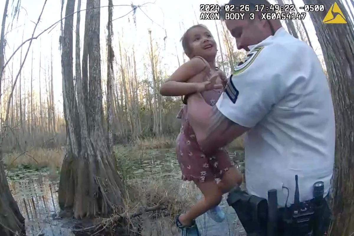 A screen capture of body camera footage showing the moment of the rescue. (Courtesy of Hillsborough County Sheriff’s Office)