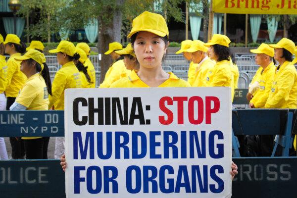 Han Yu, whose father was killed in China because of his belief in Falun Gong, at a rally at the United Nations Plaza in New York City on Sept. 24, 2019. (Eva Fu/The Epoch Times)