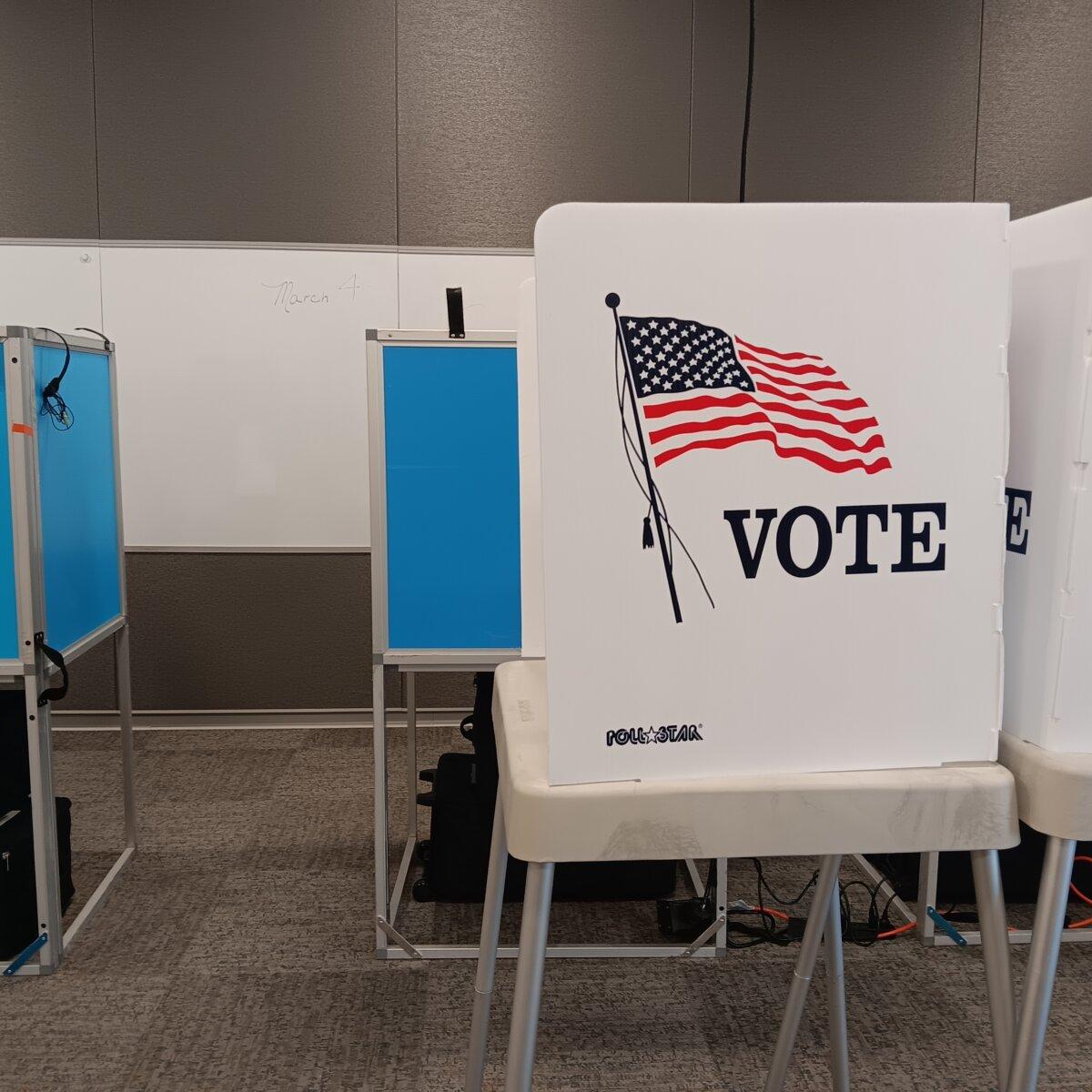 Voting booths at Belmar Library in Jefferson County, Color., on March 4. Early voting and ballot drop-offs wind down ahead of Super Tuesday, March 5, when Colorado and many other states will hold their primary elections. (Nathan Worcester/The Epoch Times)
