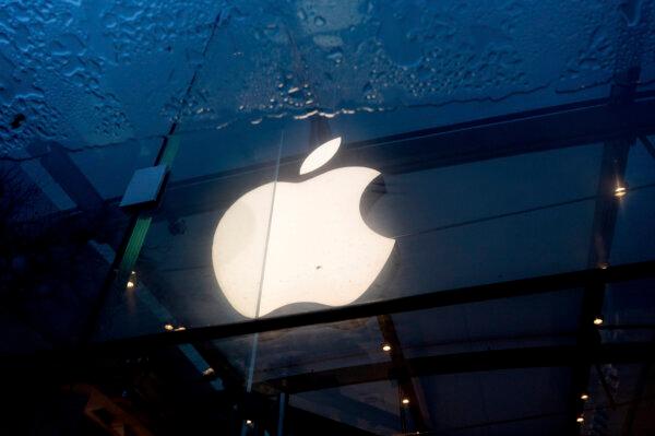 An Apple logo hangs at an Apple Store in Palo Alto, Calif., on Feb. 2, 2024. (AP Photo/Noah Berger)