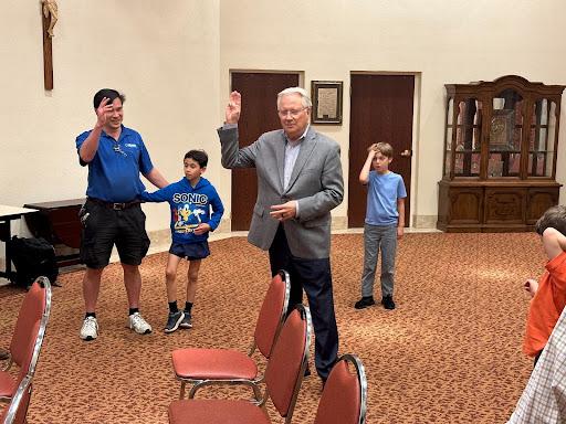 Rep. Jerry Carl (R-Ala.) recites the Scout Promise ahead of a Cub Scout meeting at Corpus Christi Catholic Church in Mobile, Alabama, on Monday, March 4, 2024. (Austin Alonzo/The Epoch Times)