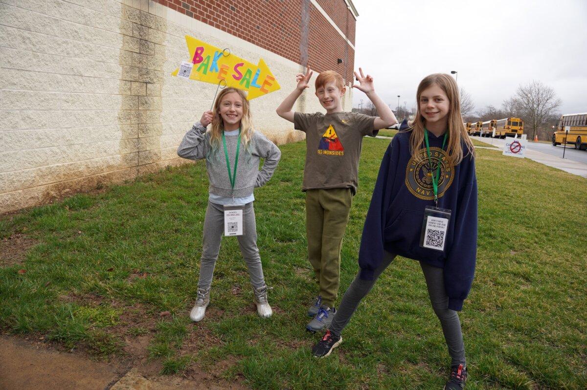 Students of Loudoun County's Mountain View Elementary School offer coffee and bakery sales at their school, one of the Super Tuesday polling stations, to fund their fifth-grader field trip in Purcellville, Va., on March 5, 2024. (Terri Wu/The Epoch Times)
