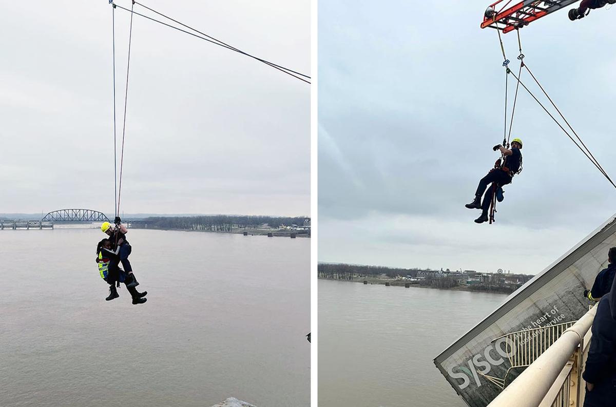 Both the firefighter and driver ascend from the precarious wreck hanging from the bridge. (Courtesy of Louisville Division of Fire)