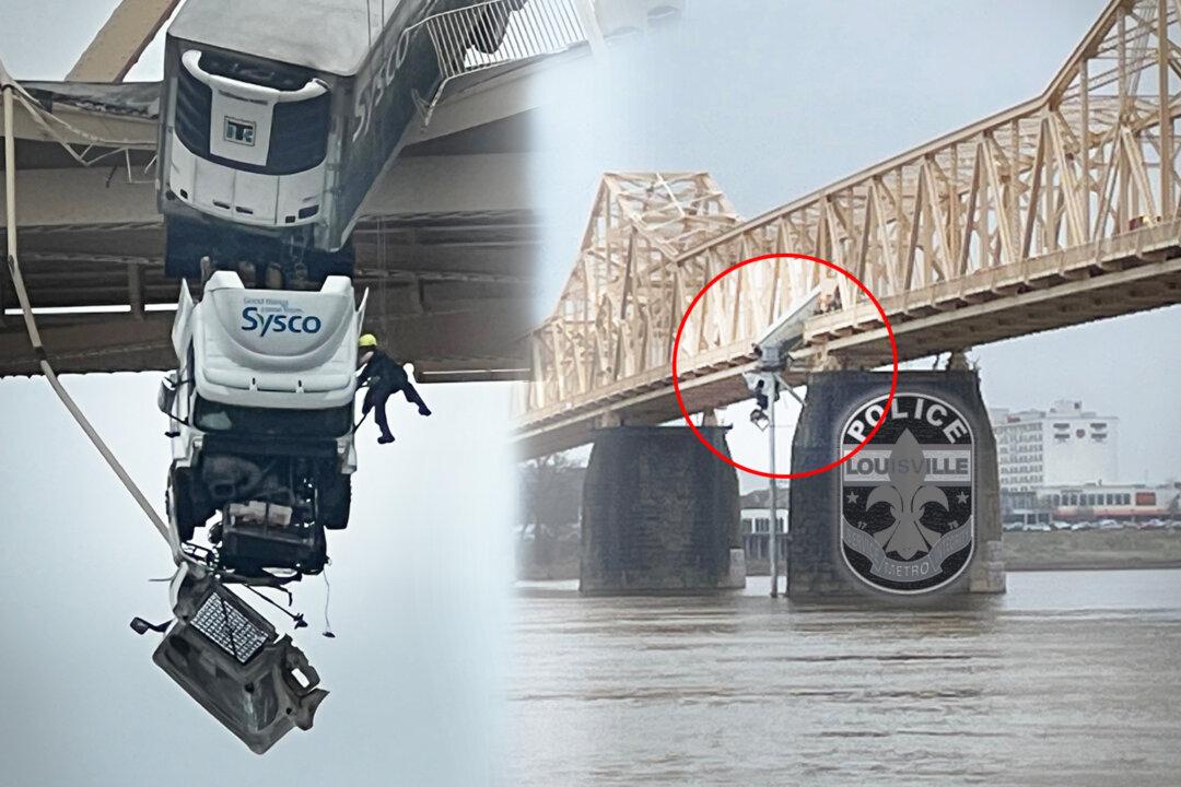 Semi-Truck Driver Teeters on Bridge 70 Feet Over Ohio River—Then Heroic Firefighter Does This: