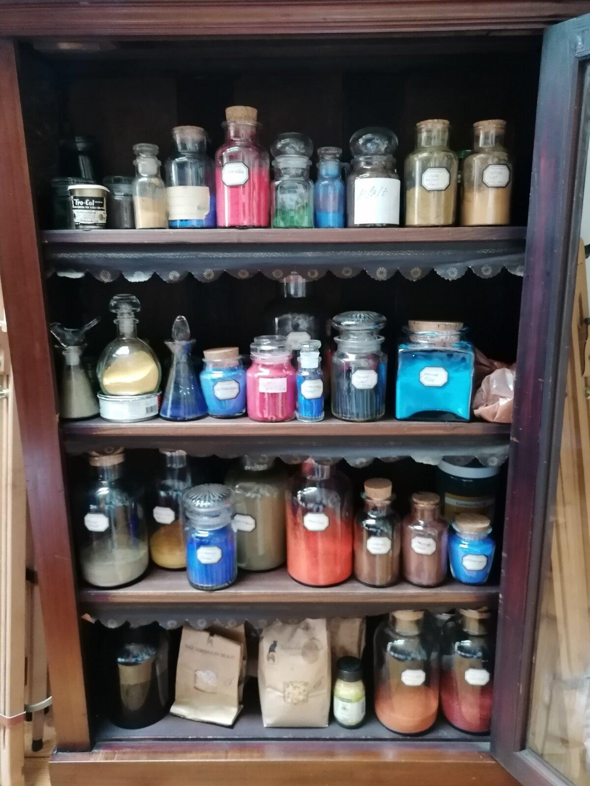 Nard Kwast's pigmentation cupboard is full of carefully sourced materials frequently used in 17th-century paintings, including vermillion, lead white, and lapis lazuli. (Courtesy of Nard Kwast)