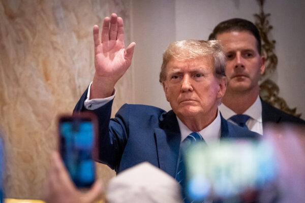 Republican presidential candidate and former President Donald Trump greets his supporters after speaking on Super Tuesday at Mar-a-Lago Club in West Palm Beach, Fla., on March 5, 2024. (Madalina Vasiliu/The Epoch Times)