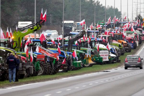 Polish farmers with their tractors beside a major road during a protest in Lomianki, near Warsaw, Poland, on March 6, 2024. (Czarek Sokolowski/AP Photo)