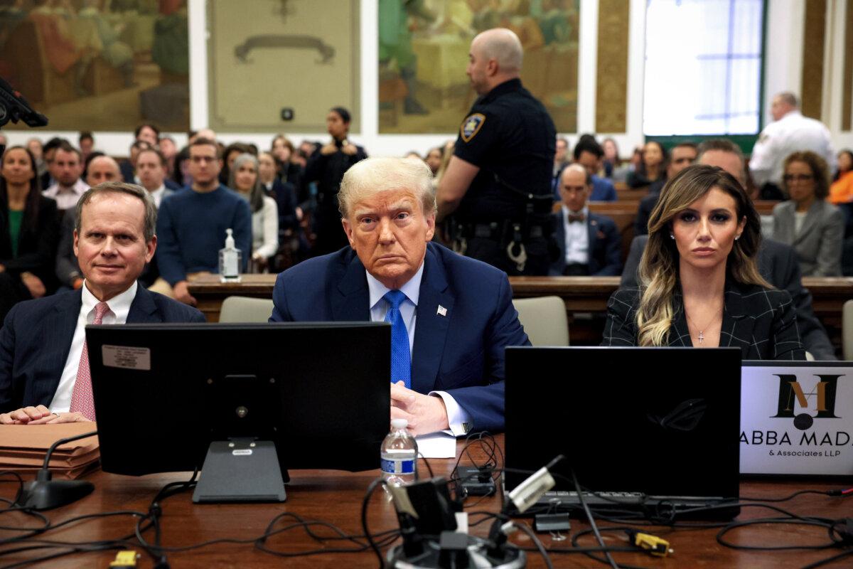 Former President Donald Trump sits in the courtroom with attorneys Christopher Kise and Alina Habba during his civil fraud trial at New York State Supreme Court in New York City on Nov. 6, 2023. (Brendan McDermid-Pool/Getty Images)