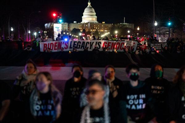 WASHINGTON, DC - MARCH 7: Demonstrators with a coalition of Pro-Palestinian groups attempt to block President Joe Biden's motorcade route during a protest near the U.S. Capitol March, 7 2024 in Washington, DC. President Joe Biden will deliver his annual State of the Union address in front of a Joint session of Congress tonight. (Photo by Kent Nishimura/Getty Images)