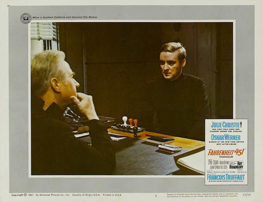 A lobby card featuring Cyril Cusack (L) and Oskar Werner in 1966’s “Fahrenheit 451,” based on Ray Bradbury’s novel in which firemen burn books rather than put out fires. (MovieStillsDB)