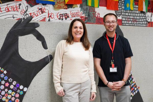 Port Jervis Middle School Spanish language teacher Carmen Medina (L) and French language teacher Austin Wilson in Port Jervis, N.Y., on March 5, 2024. (Cara Ding/The Epoch Times)