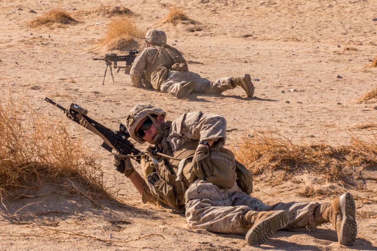 A Marine with Fox Company, 3rd Battalion, 25th Marines, 4th Marine Division, reloads his rifle during an Integrated Training Exercise at Marine Corps Air Ground Combat Center Twentynine Palms, Calif., on July 29, 2021. (Lance Cpl. David Intriago, U.S. Marine Corps)