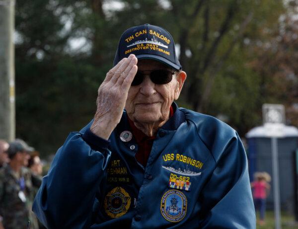 Retired Fireman 1st Class Art Fishman renders a salute during The Armed Service Salute, in Detroit, Mich., on Nov. 6, 2022. (Pfc. Joseph Honce, U.S. Army).