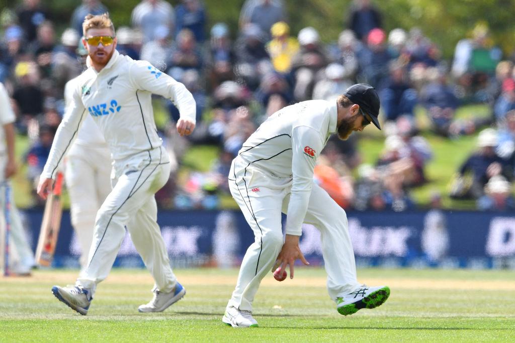 New Zealand's Kane Williamson (R) and Glenn Phillips field the ball on day four of the second Test cricket match between New Zealand and Australia at Hagley Oval in Christchurch, New Zealand on March 11, 2024. (Sanka Vidanagama/AFP via Getty Images)