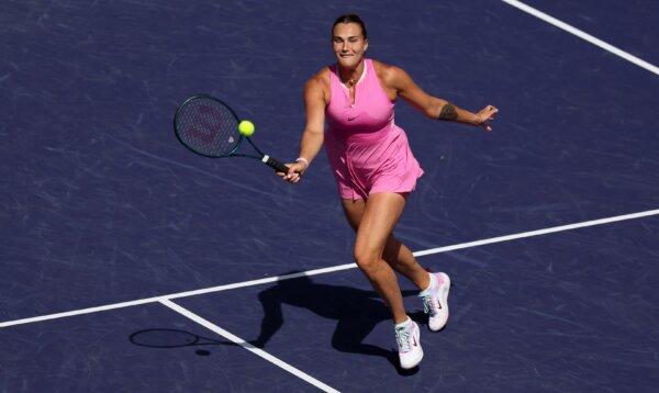 Aryna Sabalenka plays a forehand volley against Emma Raducanu during the BNP Paribas Open in Indian Wells, Calif., on March 11, 2024. (Clive Brunskill/Getty Images)