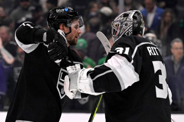 Los Angeles Kings right wing Adrian Kempe (L) celebrates with goaltender David Rittich (31) after the Kings defeat the New York Islanders in an NHL hockey game in Los Angeles on March 11, 2024. (Alex Gallardo/AP Photo)