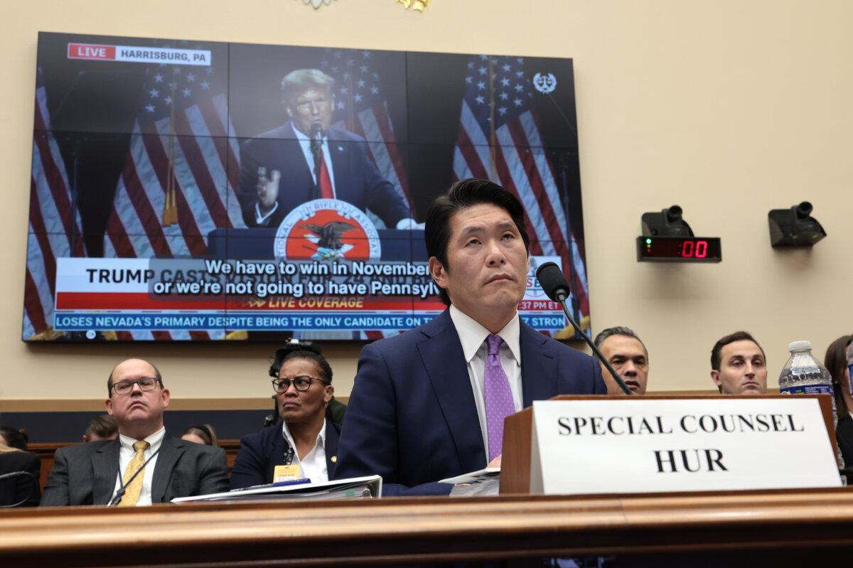 Former special counsel Robert K. Hur testifies alongside a video of former President Donald Trump to the House Judiciary Committee on March 12, 2024 in Washington. (Win McNamee/Getty Images)