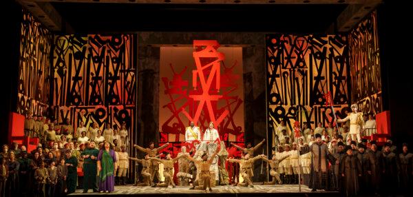 The set for Verdi's "Aida" at the Lyric Opera of Chicago is enhanced by the hieroglyph-inspired background by artist RETNA. (© Todd Rosenberg Photography 2024)