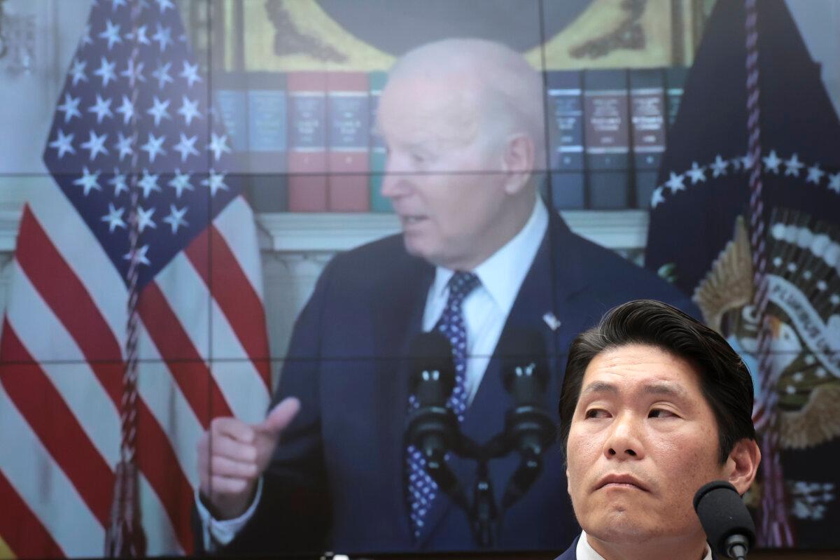 Former special counsel Robert K. Hur testifies in front of a video of U.S. President Joe Biden during a hearing held by the House Judiciary Committee in Washington on March 12, 2024. (Win McNamee/Getty Images)