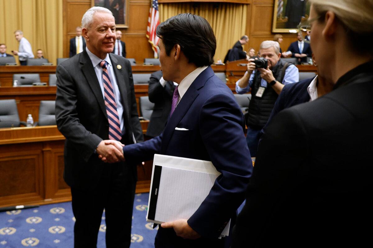 House Judiciary Committee member Rep. Ken Buck (R-Colo.) shakes hands with former Special Counsel Robert Hur after he testified before the House Judiciary Committee in the Rayburn House Office Building on Capitol Hill on March 12, 2024.(Chip Somodevilla/Getty Images)