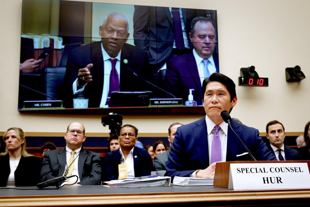Rep. Hank Johnson (D-Ga.) (on screen) accuses former special counsel Robert K. Hur of being critical of President Joe Biden in an effort to get former President Donald Trump reelected as he testifies before the House Judiciary Committee in Washington on March 12, 2024. (Chip Somodevilla/Getty Images)