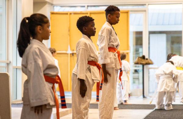 Students participate in a martial arts program at the OC Rescue Mission campus in Tustin, Calif., on March 12, 2024. (John Fredricks/The Epoch Times)