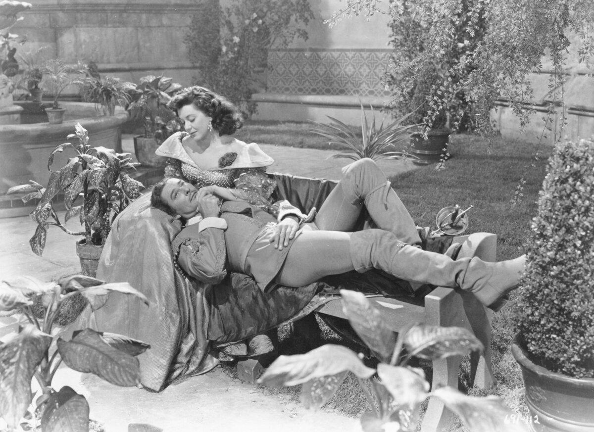 Ann Rutherford and Errol Flynn, in "The New Adventures of Don Juan." (Warner Bros.)