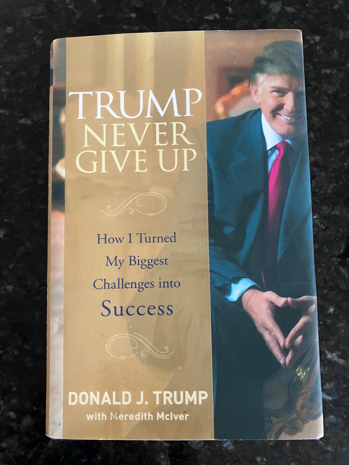 Seven years before he began his successful first run for president, Donald J. Trump authored this 2008 book, "Never Give Up: How I Turned My Biggest Challenges into Success." (Janice Hisle/The Epoch Times)