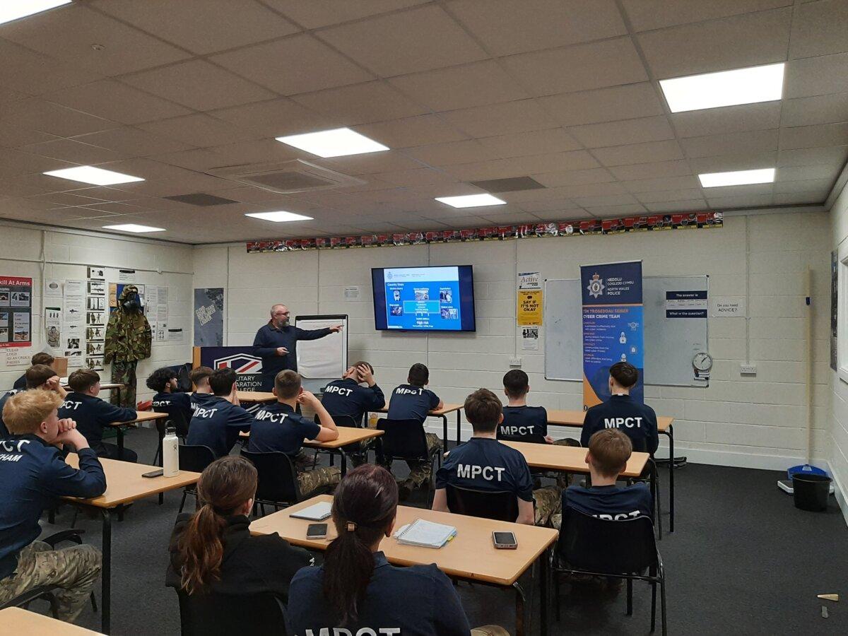 Police officers are given a briefing before a raid during county lines intensification week in North Wales on March 5, 2024. (North Wales Police)