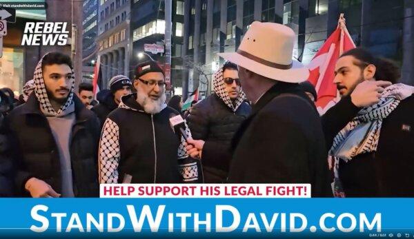 Rebel News reporter David Menzies attempts to interview a pro-Palestine protester about to start prayer in downtown Toronto on March 15, 2024. (Courtesy of Rebel News)