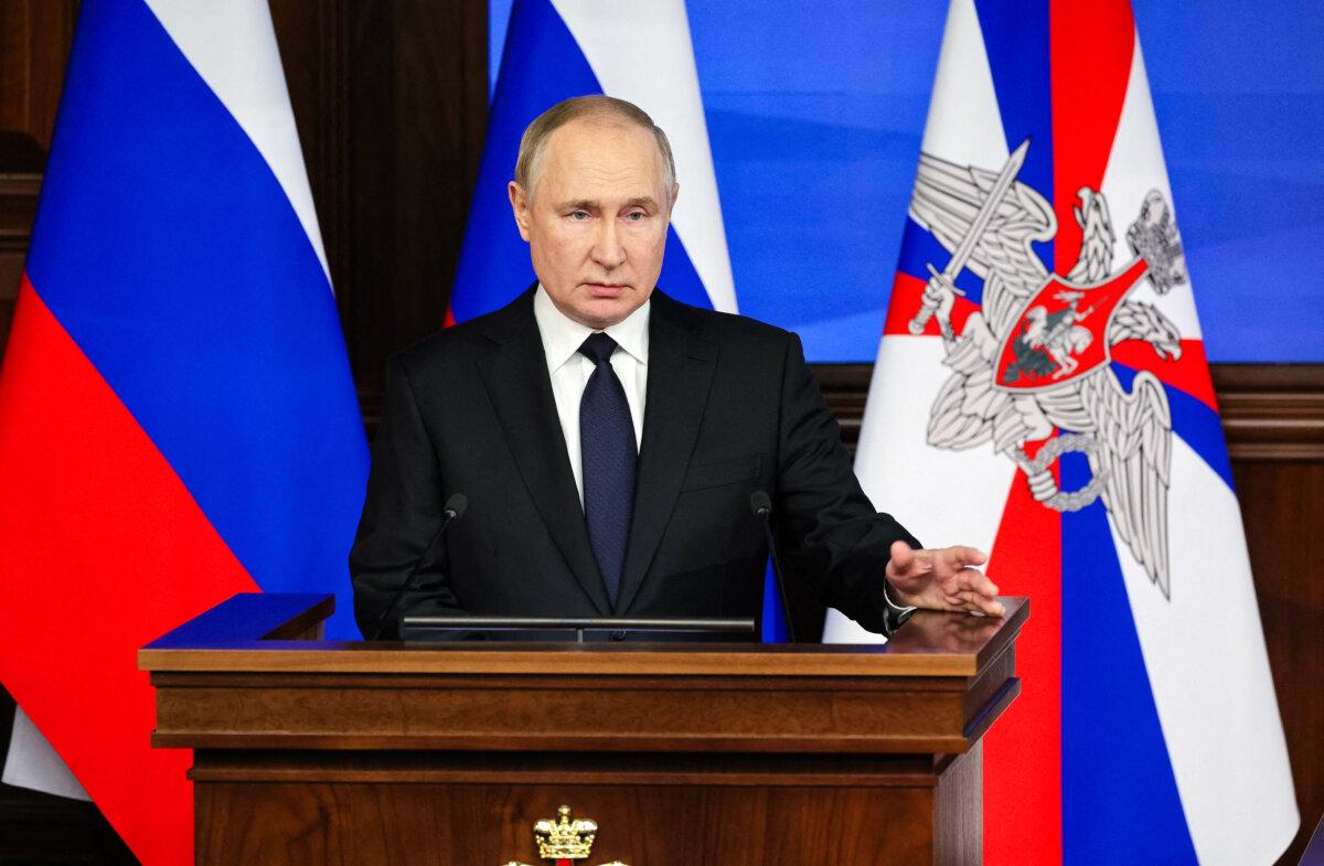 Russian President Vladimir Putin delivers a speech during an expanded meeting of the Russian Defense Ministry Board at the National Defence Control Centre in Moscow, on December 21, 2022. (Vadim Savitsky/Sputnik/AFP via Getty Images)