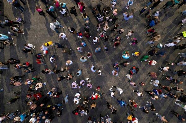 An aerial shot of the people gathered for an event. (ShutterStock)