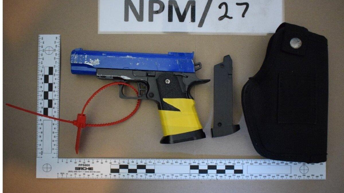 An undated image of a gun and ammunition clip that was found in the possession of Jacob Graham at his home in Liverpool, England. (Greater Manchester Police)