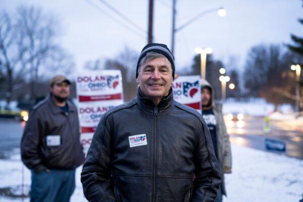 Matt Dolan, a Republican Senate candidate, meets voters just after the poll site opens at Chagrin Falls High School in Chagrin Falls, Ohio, on March 19, 2024. (Madalina Vasiliu/The Epoch Times)