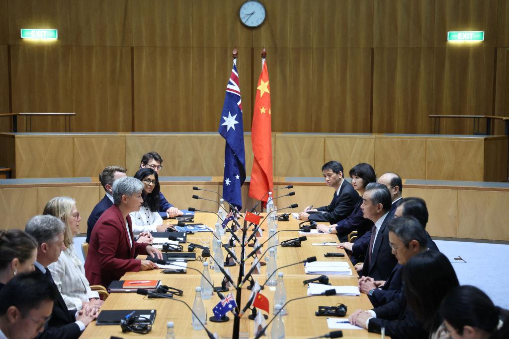 Chinese Communist Party (CCP) Foreign Minister Wang Yi (Center-R) attends a bilateral meeting with Australian Foreign Minister Penny Wong (Center-L) in Canberra, Australia on March 20, 2024. (David Gray/AFP via Getty Images)