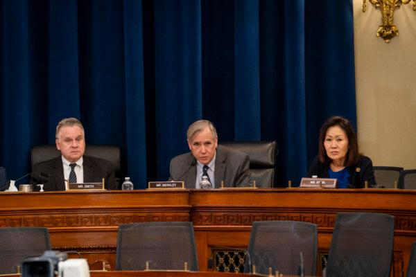 (L-R) Rep. Chris Smith (R-N.J.), Congressional-Executive Commission on China (CECC) chair; Sen. Jeff Merkley (D-Ore.); and Rep. Michelle Steel (R-Calif.) speak during a hearing about the Chinese Communist Party's forced organ harvesting before the Congressional-Executive Commission on China in Washington on March 20, 2024. (Madalina Vasiliu/The Epoch Times)