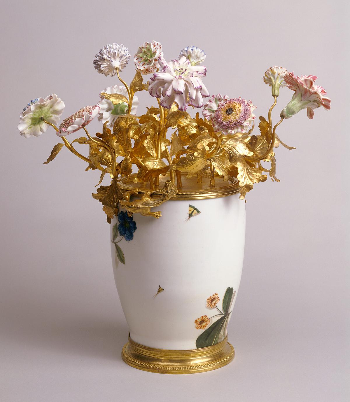 A mounted vase with flowers, vase before 1733, flowers from 1745–1750, and mount around 1745–1749, by the Meissen Porcelain Manufactory (vase), and the Vincennes Porcelain Manufactory (flowers). Hard-paste porcelain and polychrome-enamel decoration; soft-paste porcelain; gilt-bronze. Getty Center, Los Angeles. (Public Domain)