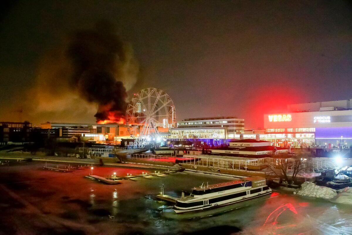 A massive blaze is seen over the Crocus City Hall on the western edge of Moscow, Russia, on March 22, 2024. (Sergei Vedyashkin/Moscow News Agency via AP)
