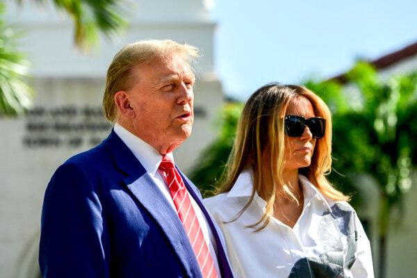Republican presidential candidate Donald Trump (L) and former First Lady Melania Trump (R) at a polling station in Palm Beach, Fla., on March 19, 2024. (Giorgio Viera/AFP via Getty Images)