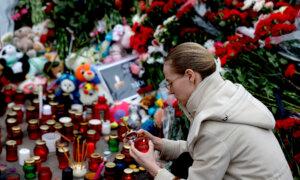 Russians Lower Flags in Mourning, Suspects Charged in Deadly Concert Hall Attack