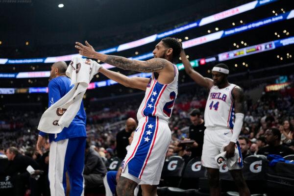 Cameron Payne of the 76ers reacts from the bench during an NBA game in Los Angeles on March 24, 2024. (Jae C. Hong/AP Photo)